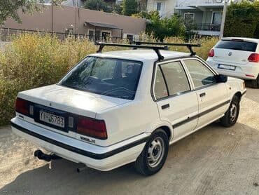 Transport: Nissan Sunny : 1.3 l | 1987 year Sedan — 1