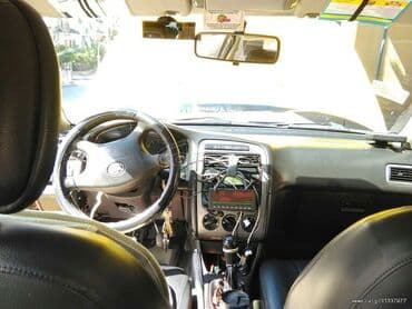 Transport: Toyota Avensis: 2 l | 2003 year Sedan — 4