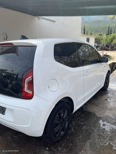 Transport: Volkswagen Up: 1 l | 2016 year Hatchback — 2