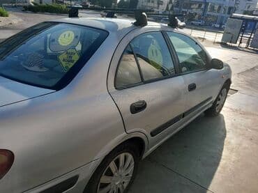 Nissan Almera : 1.4 l | 2001 year Limousine — 3
