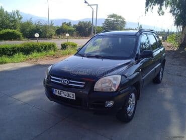 Transport: Kia Sportage : 2 l | 2005 year SUV/4x4 — 1