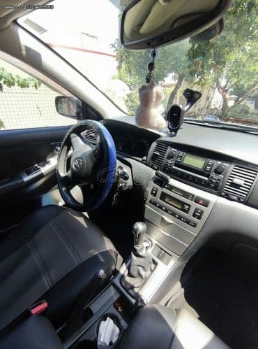 Toyota Corolla: 1.4 l | 2006 year Hatchback — 8