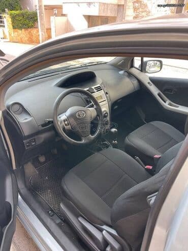 Transport: Toyota Yaris: 1 l | 2006 year Hatchback — 7
