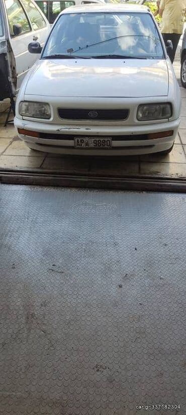 Sale cars: Daihatsu Applause: 1.6 l | 1992 year Limousine — 2