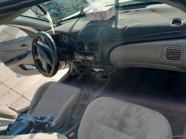 Nissan Almera : 1.4 l | 2001 year Limousine — 6