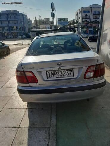 Nissan Almera : 1.4 l | 2001 year Limousine — 1