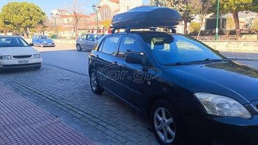 Transport: Toyota Corolla: 1.4 l | 2004 year Hatchback — 2