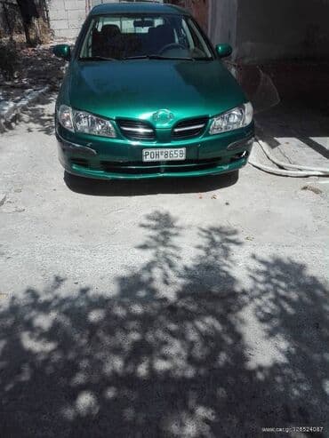 Οχήματα: Nissan Almera: 1.5 l. | 2002 έ. Κουπέ — 1