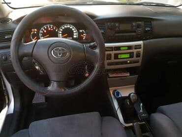Transport: Toyota Corolla: 1.4 l | 2004 year Hatchback — 10