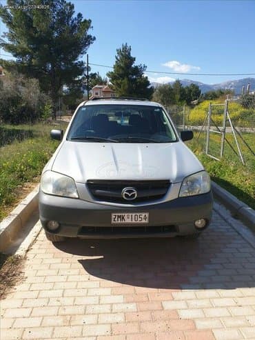 Transport: Mazda Tribute: 2 l | 2004 year SUV/4x4 — 1