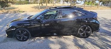 Honda: Νίκος — 7