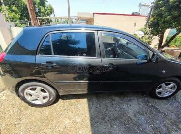 Toyota Corolla: 1.4 l | 2006 year Hatchback — 6