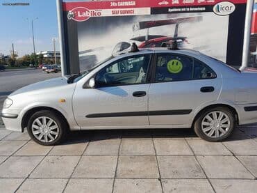 Nissan Almera : 1.4 l | 2001 year Limousine — 8