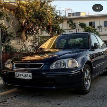 Honda Civic: 1.4 l | 1997 year Sedan — 2