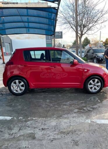 Transport: Suzuki Swift : 1.3 l | 2009 year 150841 km Hatchback — 4