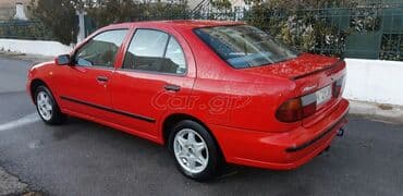 Transport: Nissan Almera : 1.4 l | 1996 year Sedan — 4