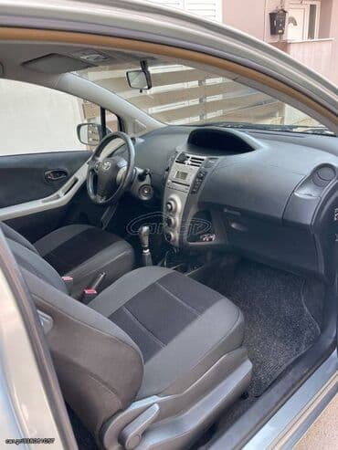 Transport: Toyota Yaris: 1 l | 2006 year Hatchback — 4
