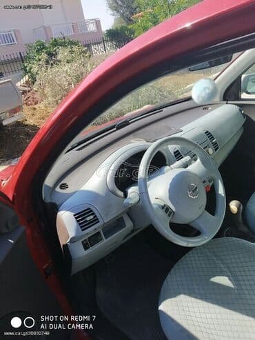Nissan Micra: 1.5 l. | 2004 έ. Sedan — 4