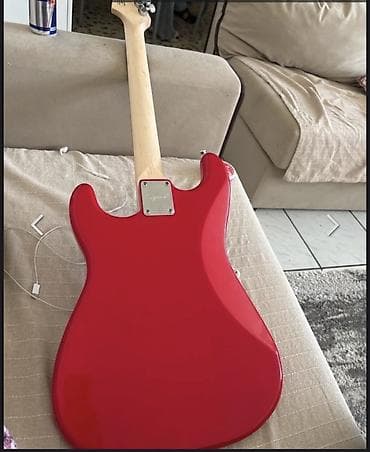 Selling this beautiful red Squier electric guitar in like-new
