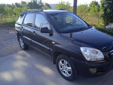 Transport: Kia Sportage : 2 l | 2005 year SUV/4x4 — 2