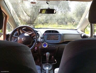 Transport: Honda Jazz : 1.3 l | 2011 year Hatchback — 4