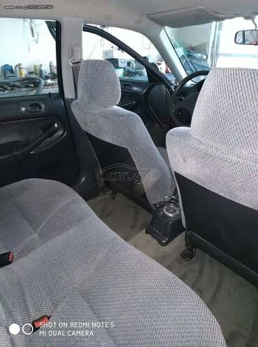 Honda Civic: 1.4 l | 1997 year Sedan — 4