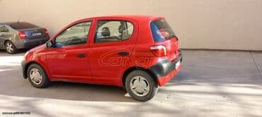 Transport: Toyota Yaris: 1 l | 2002 year Hatchback — 5