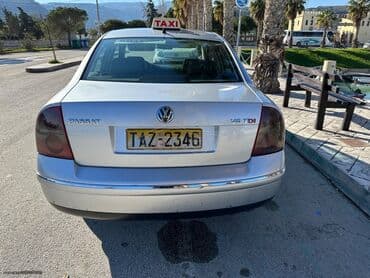 Volkswagen Passat: 2.5 l | 2004 year Limousine — 1