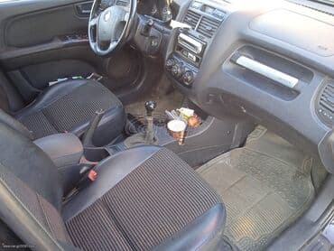 Transport: Kia Sportage : 2 l | 2005 year SUV/4x4 — 4